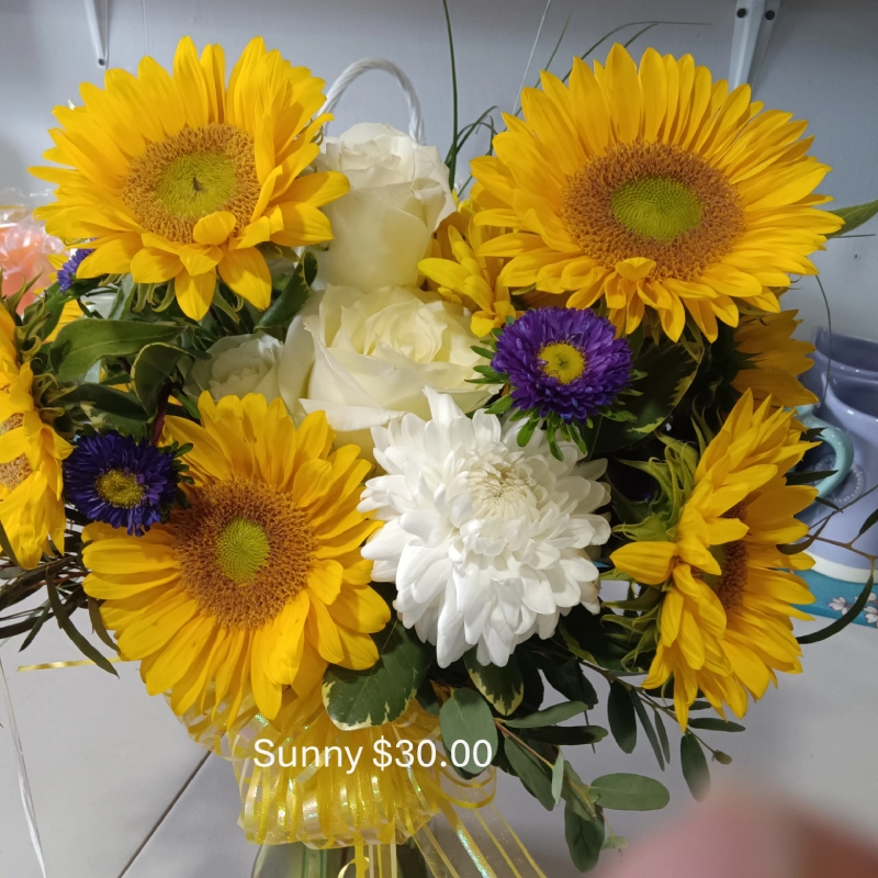 Bouquet of sunflowers and white roses.